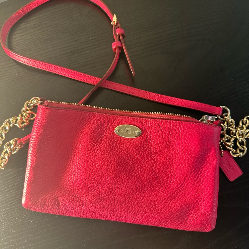 Bright pink Coach cross body purse